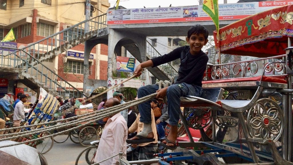 Old Dhaka Photos. A horse carriage has joined in the madness of the street in Dhaka. Old Dhaka in Photos. 