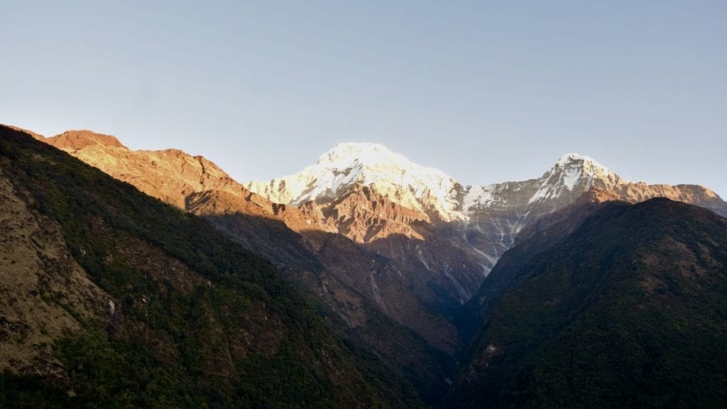 Sunrise view from The Excellent View lodge in Chhomrong during ABC Trek. 