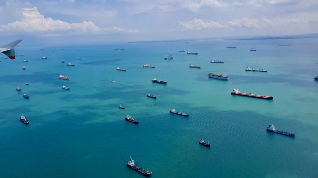 Singapore has a port and it remains  very busy all the time. 