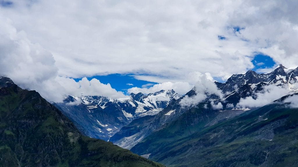 Clouds are hovering in the mountains of Himachal Pradesh. 