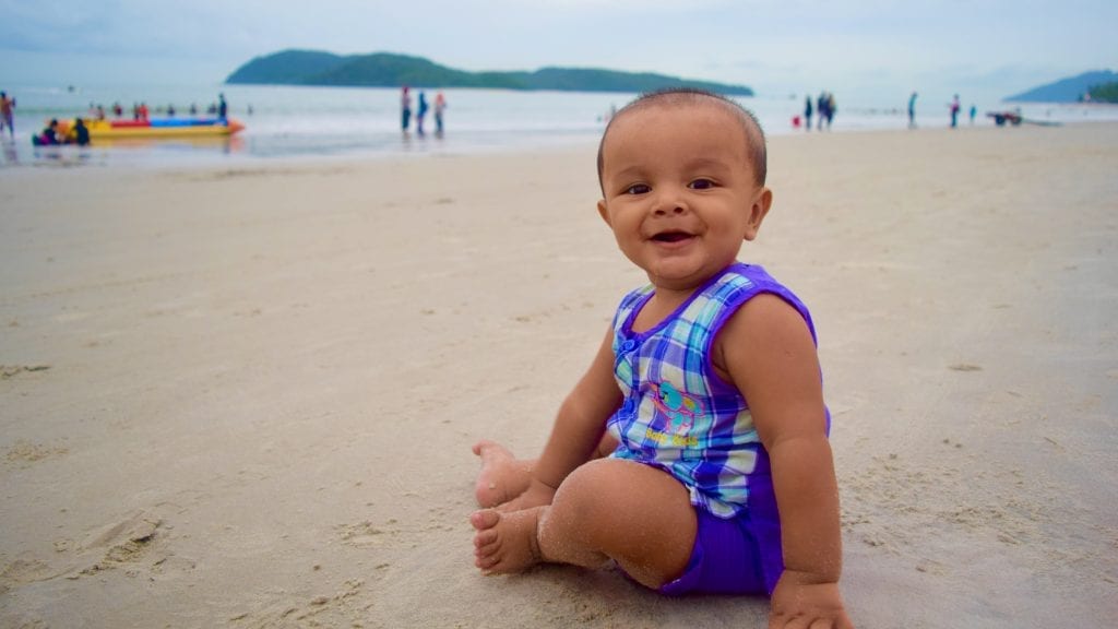 A Baby relaxing on Pantai Beach in Langkawi