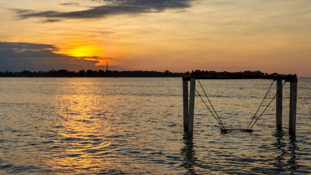 Swing during sunset in Gili Air