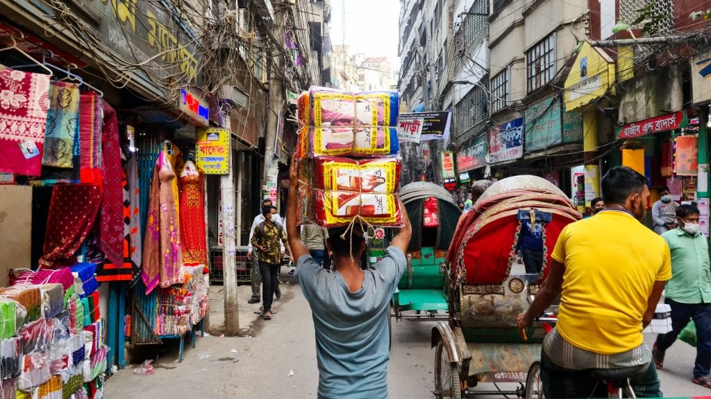 People carrying goods in old Dhaka