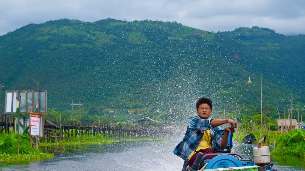 Boatman on a boat in Inle Lake